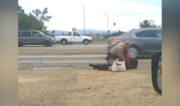California Cop Beats Black Woman Repeatedly on Freeway